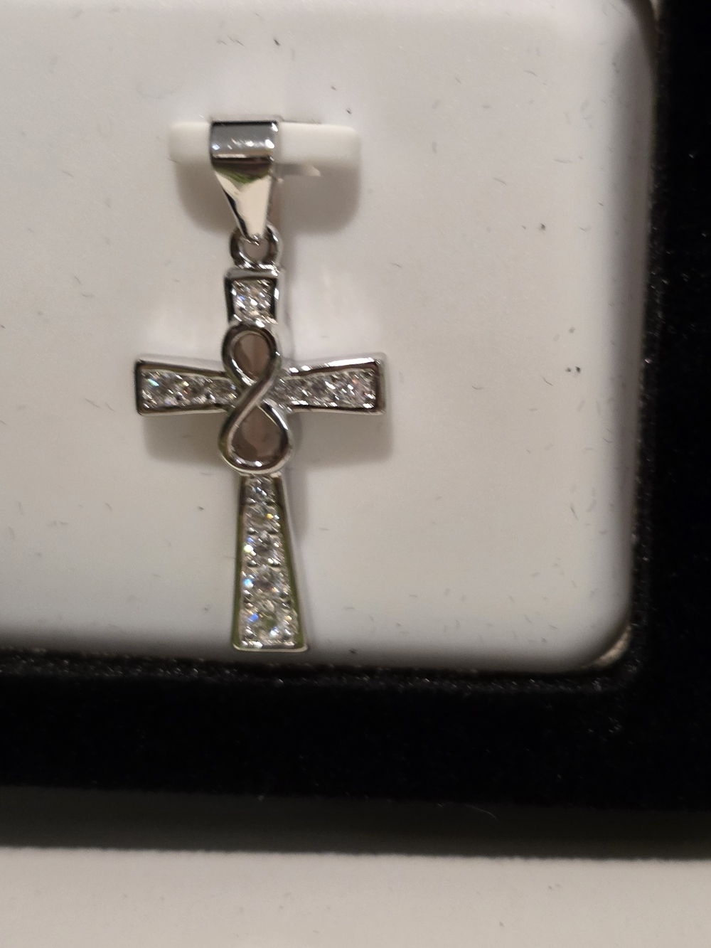 Sterling Cross Pendant with Infinity Accent and White Stones